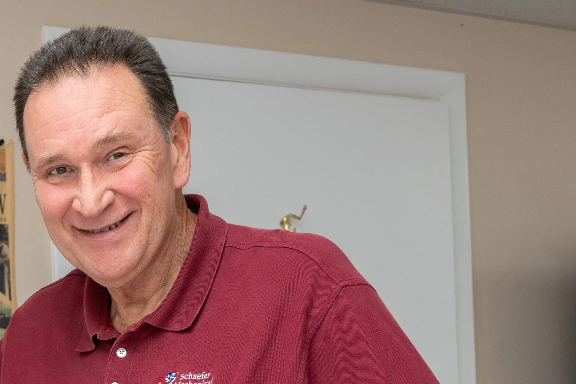 Schaefer Mechanical leader smiling in his office